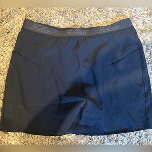 Fabletics woven pocket skirt with built in shorts